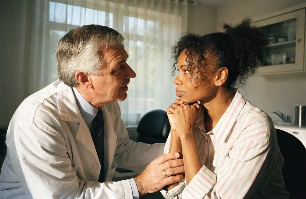 A doctor talking with a patient