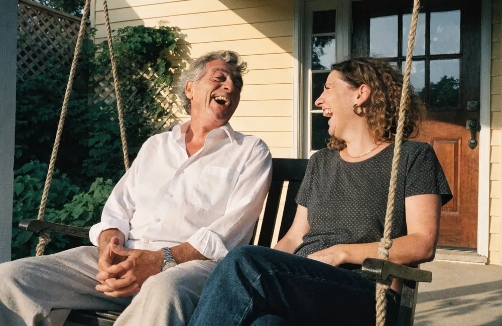 A father and daughter at home